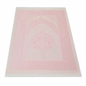 Un tapis de prière rose avec de fins motifs. Un tapis de prière élégant, léger et facile à transporter.