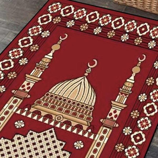 Tapis de prière rouge et mosquée