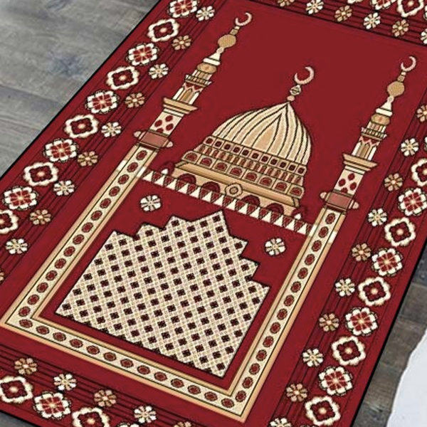 Tapis de prière rouge et mosquée