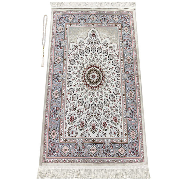 Tapis de prière rose et beige à motifs mandala. Un tapis pour la prière de l'islam avec un chaplet.